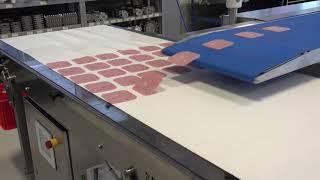 SmartLoader for loading sliced bacon or sausage on oven belts or trays
