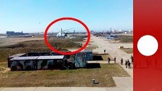 Video: Ukrainian pilots escape with aircraft as troops 'take over' air base