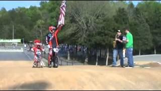 Jonas Weathers playing National Anthem on sax