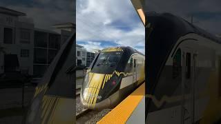 Brightline Blue Departs Aventura station