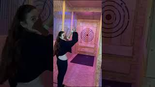 Girl is attempting axe throwing and it doesn't go well!