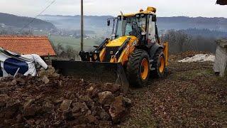 JCB 4cx backhoe loader Moving rocks