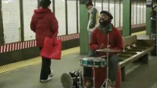 drummer and vocalist "mr. reed" rocks the bedford street L station in brooklyn