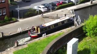 Piper narrow boat smashing it's way through a lock