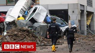 Angela Merkel shocked by 'surreal' floods devastation in Germany - BBC News