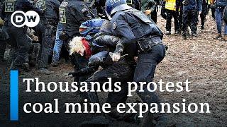 Police clash with climate protesters at German coal mine | DW News