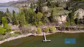 Okanagan Real Estate: 4545 Mill Rd - Private piece of paradise with Dock!