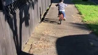 Charlie riding without stabilisers for the first time