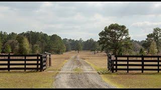 Home on Acreage For Sale in North Florida. 98 Acres with a creek and workshop. Live Oak, FL.