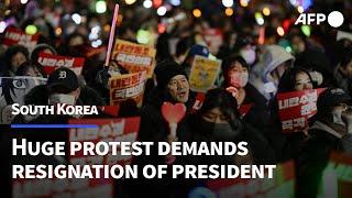 South Koreans protest as President Yoon escapes impeachment over martial law fiasco | AFP