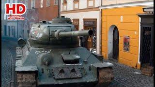 Soviet Tank enters German Village - T-34