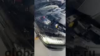 Из-под капота валит дым. Приехали на осмотр Audi Q7.