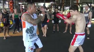 Coach Huli teaches a combination drill in the Western Boxing All Levels class