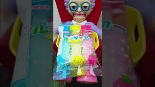 Shaking of colored sour powder  in grannys plate