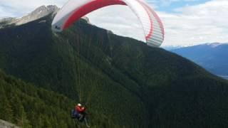 Paraglider tandem launch on Mount7, Canada