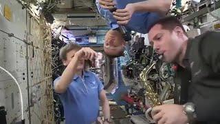 Astronaut Thomas Pesquet plays saxophone on International Space Station