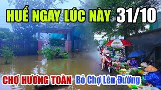 HUẾ NGAY LÚC NÀY - CHỢ HƯƠNG CẦN BỎ CHỢ LÊN ĐƯỜNG NÉ NƯỚC LŨ