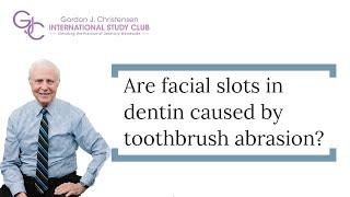 Are facial slots in dentin caused by toothbrush abrasion?