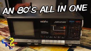 Investigating a very 80s looking portable TV, Cassette and Radio all in one.  Saisho TCR600.