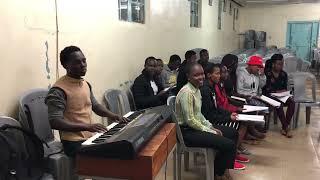 Wakristu simameni. Composer Ochieng Odongo by St. Patrick’s MMU choir.