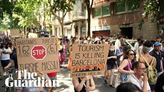 Barcelona residents rally against mass tourism