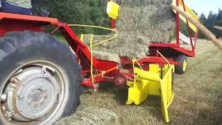 New holland 1005 stacker in action