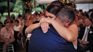 Bride & groom cry in each other's arms after hearing the letters they wrote to their fathers 