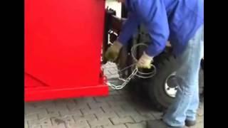 Саморазгружающийся контейнер с системой размотки
