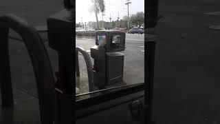 HAND SANITIZER ATTACHED TO TRASH CANS 