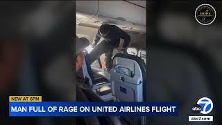 Passengers on United flight restrain unruly man after violent outburst on flight to LAX