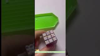 Bedazzling a miniature Rubiks cube. #miniature #bedazzled #cute