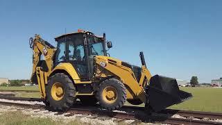 DYMAX Rail Rider S-BL Series Railgear for Backhoe Loaders