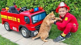 Firefighter Max rides a fire truck and helps the Cat