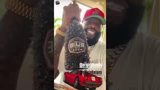 Rick Ross Promotes His New Luxury Alcohol Brand  Promotes His New Cars Cleasing Brand  Car Show 