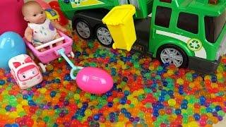 Baby doll and garbage truck Surprise eggs color candy Kinder Joy toys