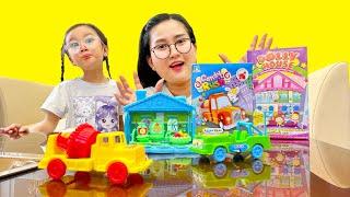 Cam Cam review hộp kẹo lắp ghép ô tô: xe trộn bê tông, xe địa hình - Cam Cam TV.