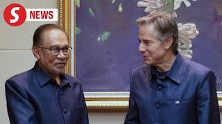 In matching silk Mao suit, Anwar meets Blinken on sidelines of Asean summit