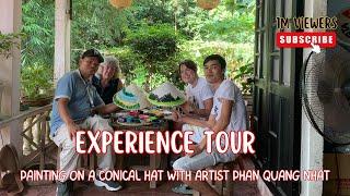 Experience painting on a conical hat with artist Phan Quang Nhat|Lucky Tour Guide