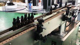 Round bottle labeller丨Automatic serum 30ml beard oil dropper bottle labeling machine video