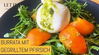 Burata mit Pistazienpesto auf gegrilltem Pfirsich mit Rucola