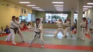 USMAC Women Black Belts showing how to kick!