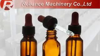 R - 2 ) Amber Glass Dropper Bottle Filling Machine - Reliance Machinery Co