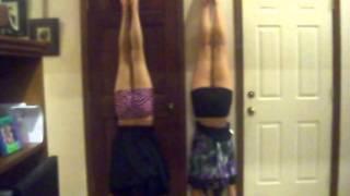 Lovely Ladies Doing Handstands In Dresses