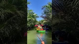 A float through the palm forests of Hoi An, Vietnam