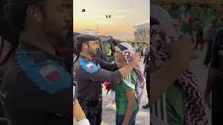 Beautiful moment in fifa World Cup when a Qatari security guy helps a Mexican fan wear a ghutra ️