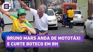 Bruno Mars em BH: Cantor anda de mototáxi e curte cerveja em boteco raiz; veja vídeos