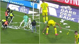  NANTES VS LE HAVRE INTERRUPTED as Nantes fans throwing tennis balls and toilet paper to pitch