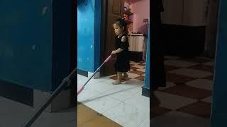 my little girl moping floor 
