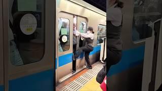The process of manually closing the doors of a subway train