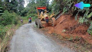 grader heavy equipment works to slope